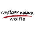 Logo creatives wohnen wölfle